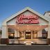 Hampton Inn & Suites Ft. Wayne-North exterior entrance in Fort Wayne with illuminated sign