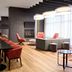 Residence Inn by Marriott Montreal Airport lobby lounge in Montreal with seating, fireplace and modern decor