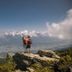 Hotel Geisler Tulfes, Tulfes: hikers on a rocky overlook above a valley and mountain range