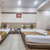 Hotel Sai Chhatra Shirdi twin room with two single beds and bedside table