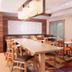 Fairfield Inn by Marriott Charlotte Gastonia meeting room with tables, chairs, and colorful carpet
