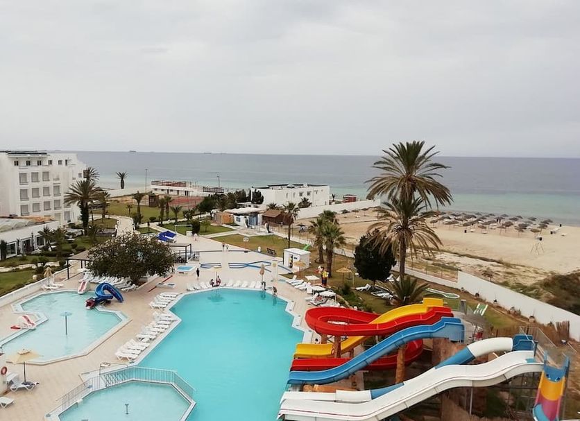 Aylimas - Families Only in Monastir with pools, colorful water slides, and a beach view