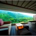 Hakone Ginyu in Hakone balcony suite with mountain and forest view, sofa, table and soaking tub
