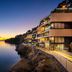 Boutique & Design Hotel Navis in Opatija with cliffside terraces overlooking a calm sea at sunset
