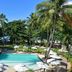 Iara Beach Hotel Boutique in Salvador with tropical pool, palm trees and ocean views