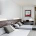 Hotel HC Mollet Barcelona room with twin beds, desk, wall-mounted TV and balcony view in Mollet del Vallès