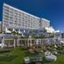 Hilton Garden Inn San Juan Condado with oceanfront lawn, cabanas and lounge chairs in San Juan