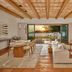 The St. Regis Punta Mita Resort living room with ocean-view terrace at sunset in Punta de Mita