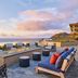 Timbers Kauai Ocean Club & Residences in Lihue with oceanfront fire pit seating and sunset views