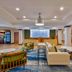 Fairfield Inn & Suites by Marriott Greenwood lobby with seating area and coffee station