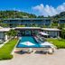 Silversands Grand Anse in St. George's with a beachfront infinity pool and lush hillside backdrop