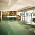 Hotel Terme Marine Leopoldo II indoor thermal pool with guests in Grosseto