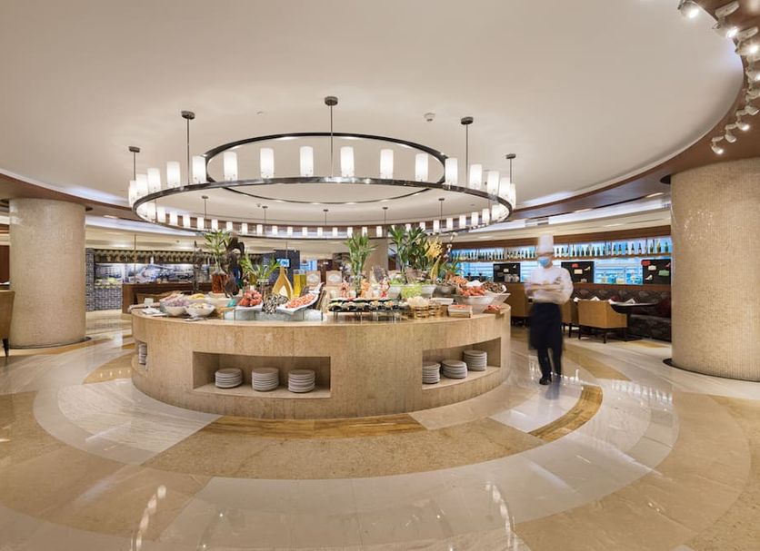 Glenview Itc Plaza Chongqing buffet restaurant with central island display and circular chandelier in Chongqing