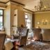 Grand Hotel Stamary, Zakopane: elegant lounge with armchairs, chandelier, fireplace, and wall-mounted TV