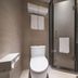 Hanting Hotel Nanjing Hunan Road bathroom with toilet, glass shower, and sink in Nanjing
