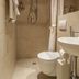Soggiorno Pezzati Florence bathroom with shower, toilet, and pedestal sink