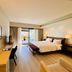 Libertad Hotel Buenos Aires guest room with king bed, desk, and balcony view in Buenos Aires