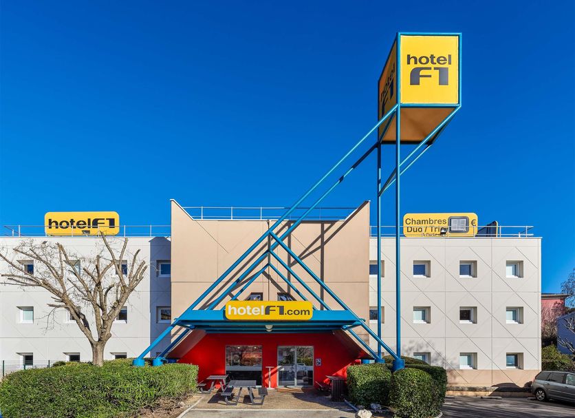 hotelF1 Annemasse in Saint-Cergues exterior with blue stairway and yellow signage