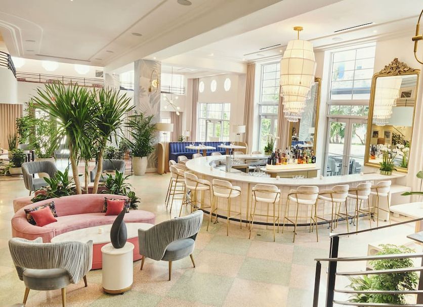 Park Central South Beach Miami Beach lobby lounge with bar seating and lush indoor plants