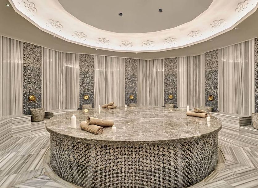 Day One Beach Resort & Spa - Adult Only in Alanya spa room with round stone relaxation pool