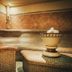 Gut Lauterbad Hotel in Freudenstadt spa with tiled sauna benches and decorative fountain