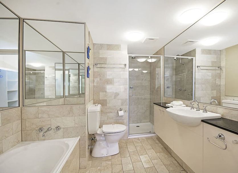 Clubb Coolum Beach Resort bathroom with bathtub, shower, toilet and vanity in Coolum Beach