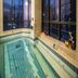 Hotel Pharos Seoul indoor pool with floor-to-ceiling city views