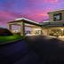 Hotel 28 Boise Airport, an Ascend Collection Hotel in Boise exterior at sunset with covered entrance