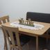 Gästehaus Klug in Sankt Stefan ob Stainz with a dining table, chairs and dark corner bench seating