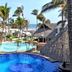 Mar Paraiso Queen in Acapulco with ocean view, palm trees, and multiple outdoor pools