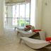 Hotel Terme Marine Leopoldo II in Grosseto, spa lounge with curved chaise loungers and window view