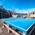 Barrier Island Station in Duck with an outdoor ping-pong table and resort buildings under a bright sky