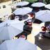 Golden Zambezi Lodge in Lusaka terrace with white umbrellas and outdoor seating