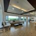 The Jungle House, Hengchun Township: spacious lounge with large windows and distant green views