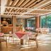 Le Méridien Khao Lak Resort & Spa restaurant with brick oven and checkered tablecloths