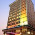 Century Star Hotel in Foshan, illuminated high-rise exterior at dusk