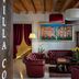 UNAHOTELS Eco Hotel Villa Costanza Venezia lobby with red leather seating and exposed wood beams in Venice