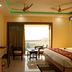 Hotel Sagar Kanya Inn, Puri: room with balcony view and ceiling fans
