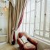 Riad Dar Ayur, Marrakech: elegant room with bathtub, armchair, and large lattice window