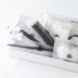 Apa Hotel Kanazawa Nishi amenity set with towels, hair ring, bath cap and toiletries