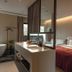 Terra Art Sky Garden Boutique Hotel Chengdu room with bed, freestanding tub and open vanity