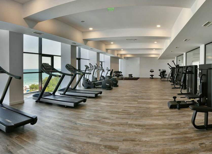 Grifid Hotel Encanto Beach gym with treadmills and strength equipment in Golden Sands