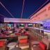 Ellis Island Hotel Casino & Brewery Las Vegas bar and lounge with high-top seating and neon lighting