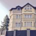 La Petite Apartments & Rooms in Gdansk, exterior of a beige multi-story hotel building