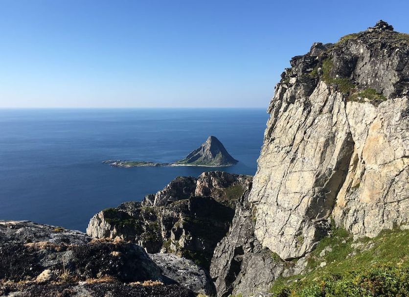 Midnattsol Rom og Hytter in Bleik with ocean views and rugged coastal cliffs