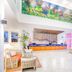 Grand Decameron Cornwall Beach lobby with reception desk, high ceilings, and oceanfront seating in Montego Bay