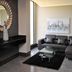 Velmore Hotel & Spa in Pretoria with a modern lounge, sectional sofa, glass coffee table and wall art