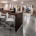 City Express by Marriott Oaxaca lobby seating area with bar-style counter and stools