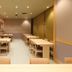 Dining area at Onyado Nono Asakusa Bettei in Tokyo with wooden tables and chairs