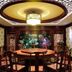 Paragon Hotel Xiangtan private dining room with round table, ornate ceiling light and floral mural